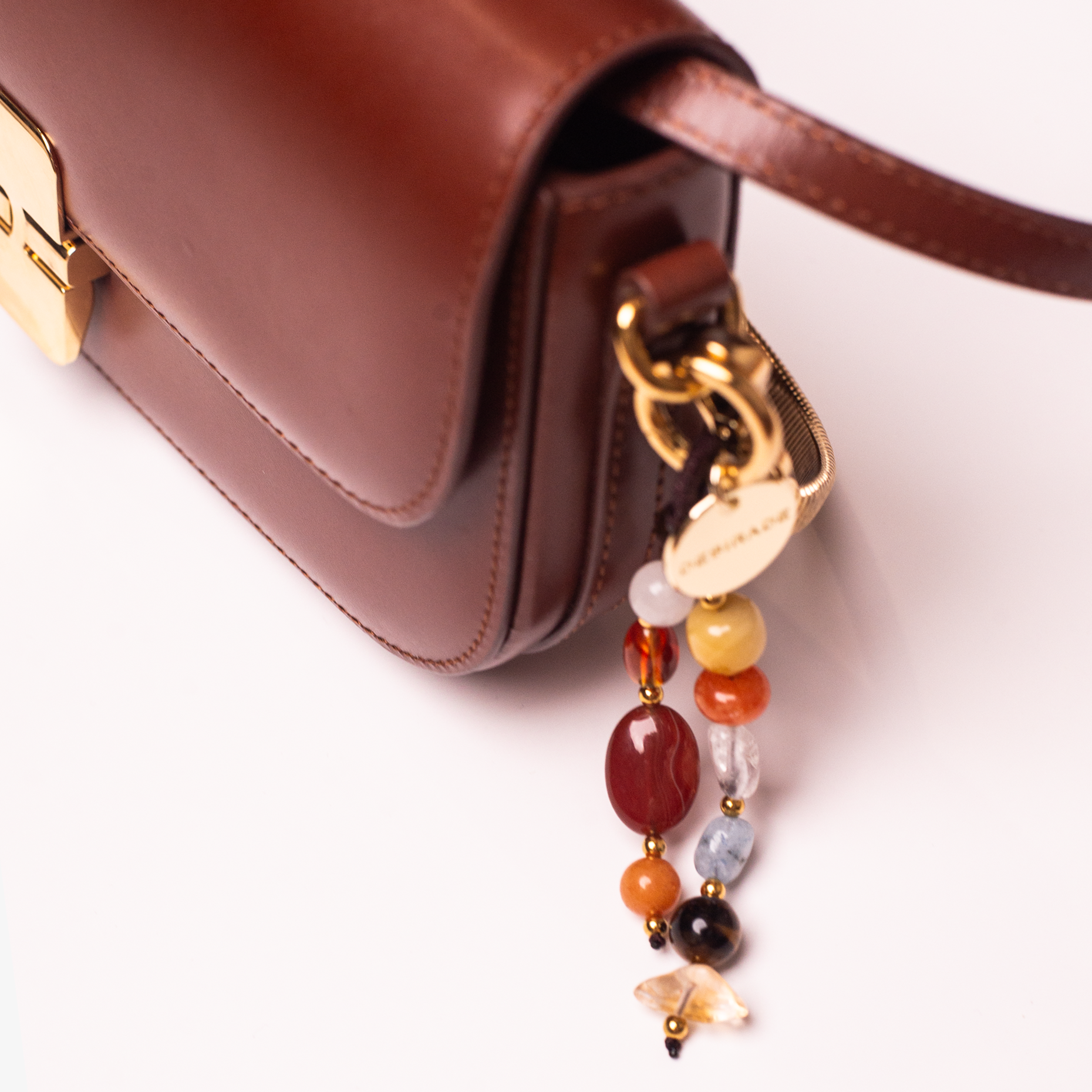 AMBRA SOLE – Charm pentru geantă din pietre naturale